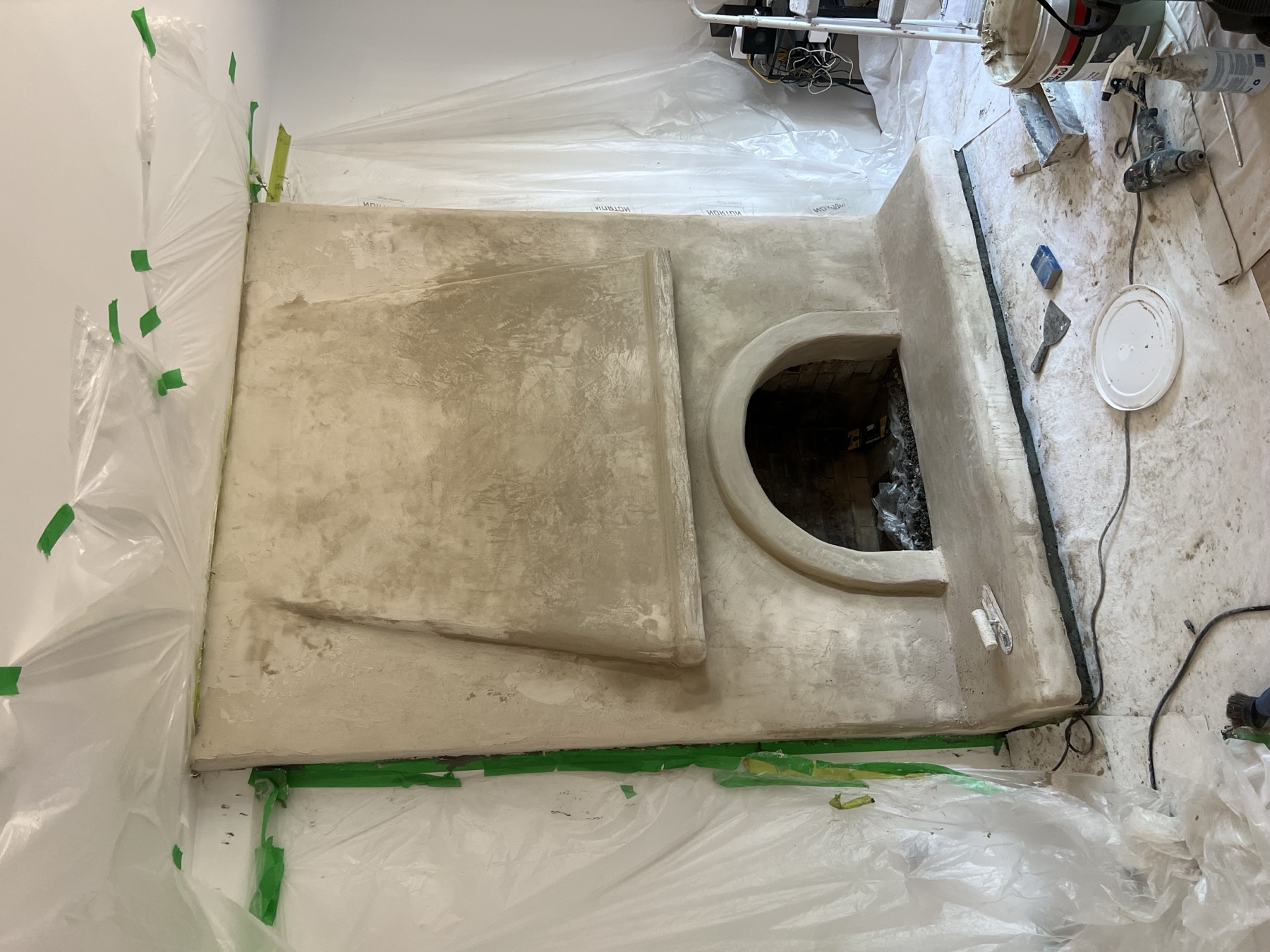 Intermediate plaster preparation stage on the Brookswood fireplace