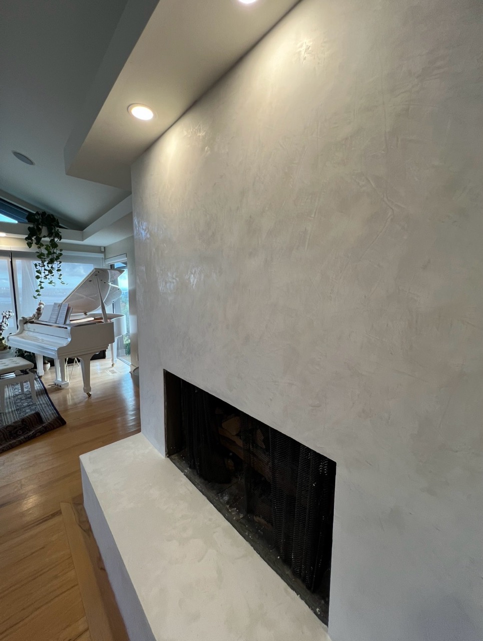 Side detail of Marmorino texture on a finished fireplace wall